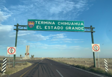 A highway sign says "Termina Chihuahua, El estado grande"