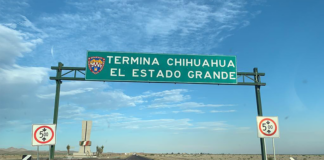 A highway sign says "Termina Chihuahua, El estado grande"