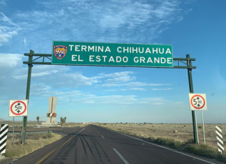 A highway sign says "Termina Chihuahua, El estado grande"