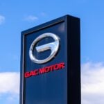 Samara, Russia - April 16, 2024: Stela with Gac Motor logo against a sky background. Gac Motor is a Chinese automobile manufacturer