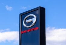 Samara, Russia - April 16, 2024: Stela with Gac Motor logo against a sky background. Gac Motor is a Chinese automobile manufacturer