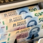 Mexican 500-peso bills in a bill counting machine