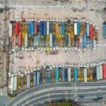Aerial view of trucks preparing to carry cargo