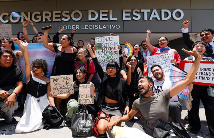 Activists with signs, trans flags and rainbows celebrate the passage of Querétaro's Gender Identity Law in late April.