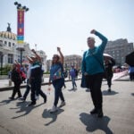 Members of the CNTE teachers union march past Mexico City's Palacio de Bellas Artes on Tuesday.