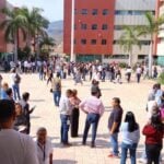 People evacuated from a building following an earthquake