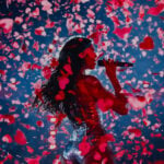 Dua Lipa sings surrounded by confetti on stage in Mexico City