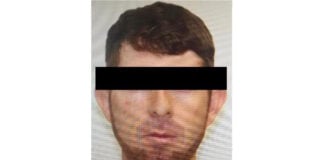 A mug shot of Isaí "El Chinacate" Martínez Cepeda with his eyes blacked out for privacy