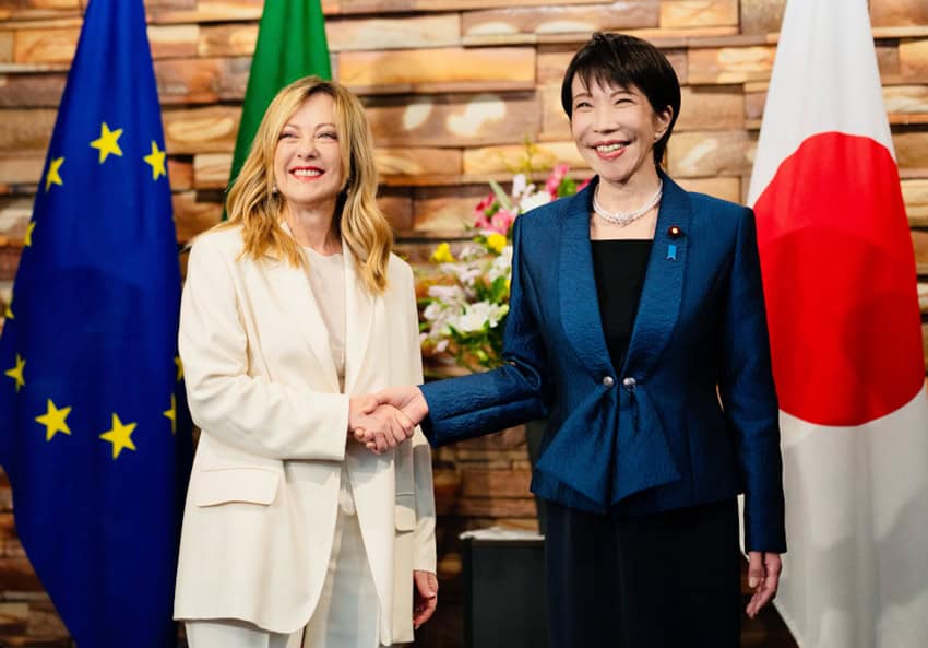 Italian Prime Minister Giorgia Meloni and Japanese Prime Minister Sanae Takaichi shake hands