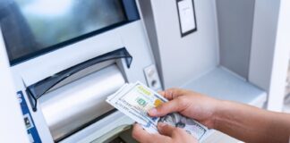 Atm money cash machine. Woman withdraw money bill. Holding american hundred dollar cash. Bank credit card, us dollar