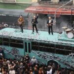 U2 atop bus