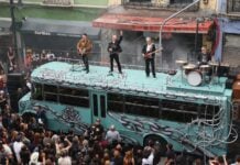 U2 atop bus
