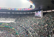 A jumbo screen in Mexico City Stadium shows a cartoon goal after Mexico's second goal against South Africa
