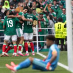 Mexico's offense ( Julián Quiñónes and Raúl Jiménez) celebrates after delivering a home-turf win in Mexico City Stadium at the 2026 FIFA World Cup's opening match.