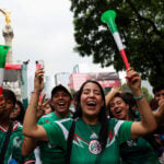 Mexican World Cup soccer fans gather at Mexico City's Angel of Independence