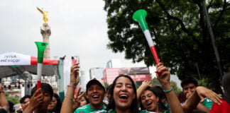Mexican World Cup soccer fans gather at Mexico City's Angel of Independence