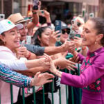 President Sheinbaum greets supporters outside a rally on May 31 to mark the second anniversary of her election in June 2024.