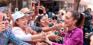 President Sheinbaum greets supporters outside a rally on May 31 to mark the second anniversary of her election in June 2024.