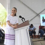 President Sheinbaum smiles from the podium of her morning press conference in Veracruz June 5