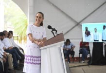 President Sheinbaum smiles from the podium of her morning press conference in Veracruz June 5