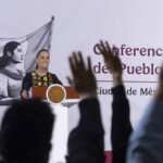 President Sheinbaum looks out across the press pool at her morning press conference
