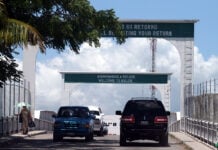 A sign the Chetumal crossing on Mexico's southern border reads "Welcome to Belize / Bienvenido a Belice"