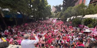 With shouts of "Fuera Morena!" (Out with Morena), supporters of Somos México, one of two newly certified political parties in Mexico, celebrate their registration at a rally Sunday near the Monument to the Revolution in Mexico City.