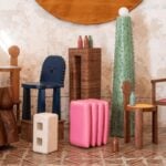 Various pieces of handmade furniture in whimsical shapes and bright colors