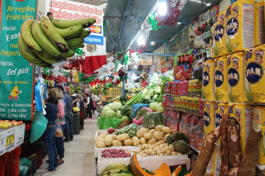 Mercado Medellín in Mexico City, with an array of groceries and produce on display