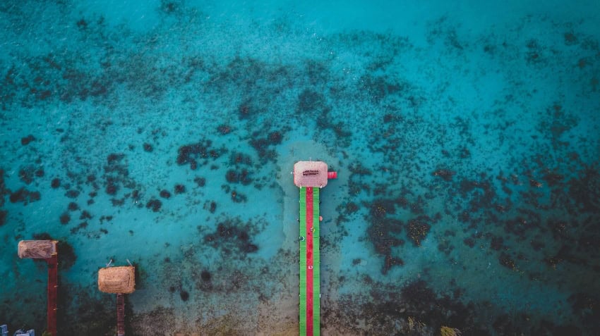 Bacalar, docks extending into the lake
