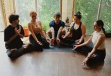 Yoga practitioners on mats