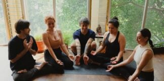 Yoga practitioners on mats
