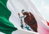 Mexican flag flying in the breeze over Monterrey