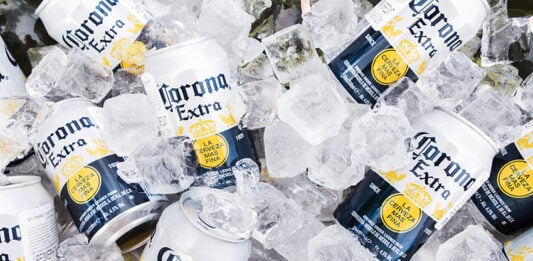 Corona Extra beer cans on ice