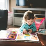 Child looking at a book