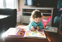 Child looking at a book