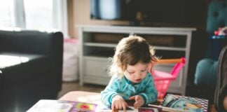Child looking at a book