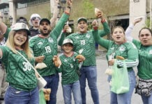 A group of fans in Mexican world cup soccer jerseys in Guadalajara