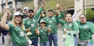 A group of fans in Mexican world cup soccer jerseys in Guadalajara