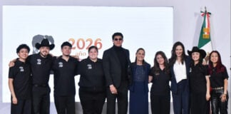 President Sheinbaum poses with the seven U.S.-based semi-finalists of the singing competition México canta at her July 23 press conference.