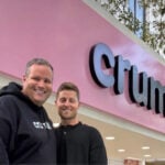 Crumbl co-founders (and cousins) Jason McGowan and Sawyer Hemsley outside a Crumbl bakery