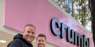 Crumbl co-founders (and cousins) Jason McGowan and Sawyer Hemsley outside a Crumbl bakery