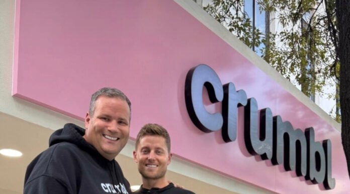 Crumbl co-founders (and cousins) Jason McGowan and Sawyer Hemsley outside a Crumbl bakery