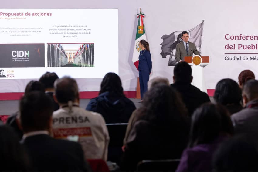 Foreign Affairs Minister Roberto Velasco shares a slide reading "propuesta de acciones" at a press conference