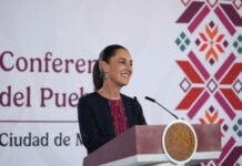 President Sheinbaum at the podium of her July 10 press conference