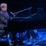 Elton John at the piano
