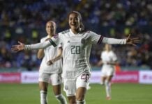 Diana García of El Tri Femenil celebrating a goal in a 9-0 blowout of Surinam