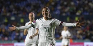 Diana García of El Tri Femenil celebrating a goal in a 9-0 blowout of Surinam