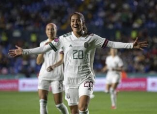 Diana García of El Tri Femenil celebrating a goal in a 9-0 blowout of Surinam