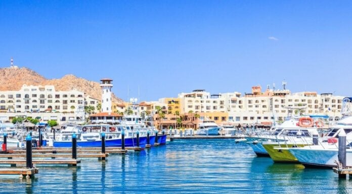 Cabo San Lucas Marina looking at El Tesoro with its distinctive lighthouse feature.